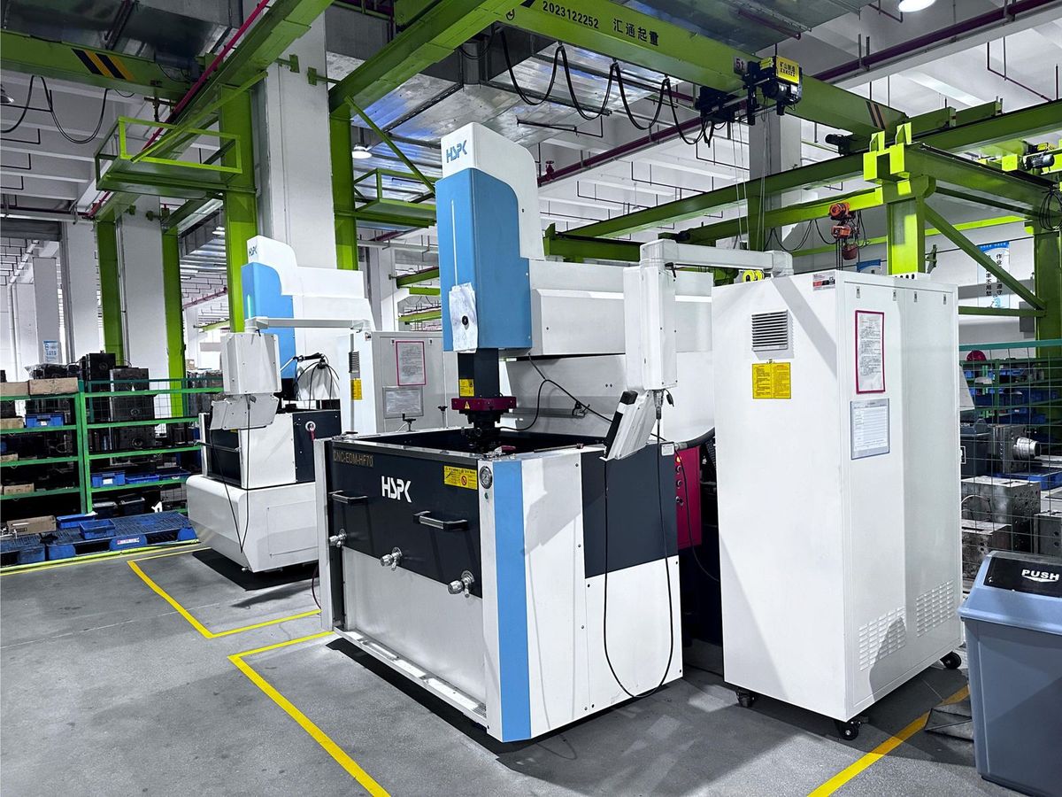CNC sinker EDM machine with a mould block clamped on the table